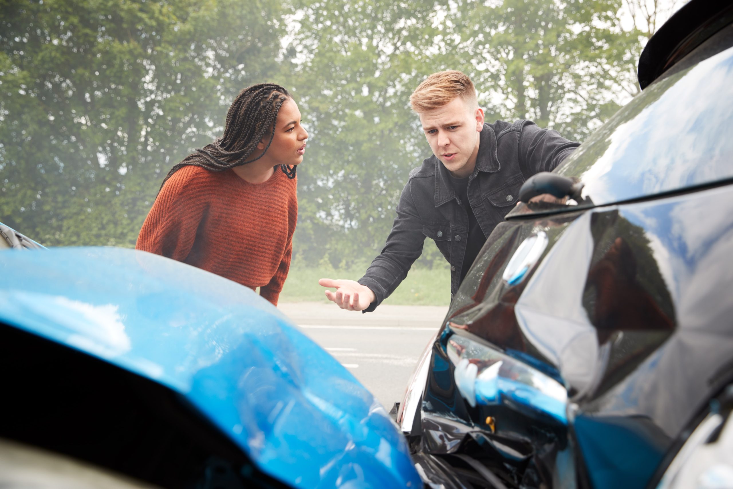 People Discussing Car Accident
